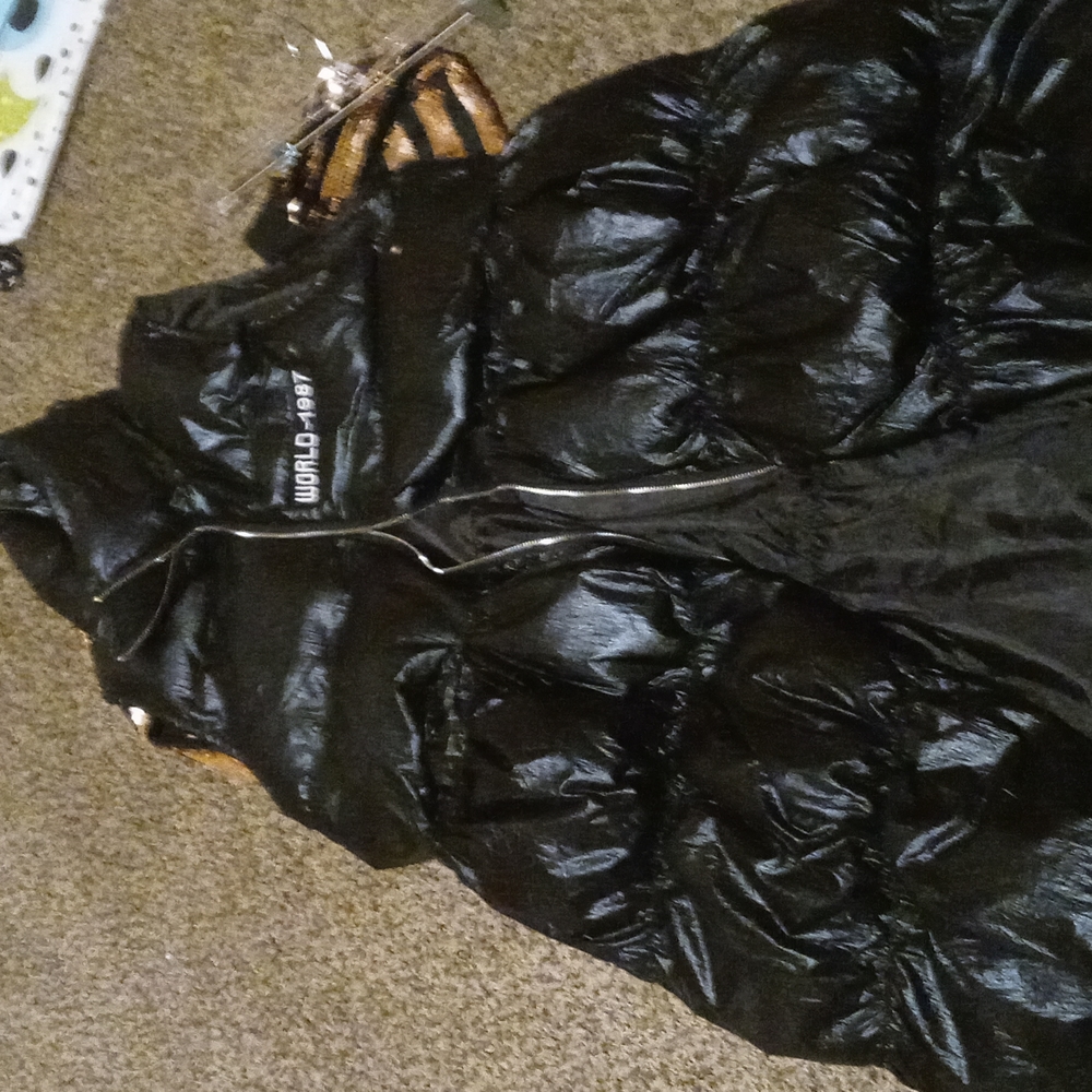 Black puffy vest knee length